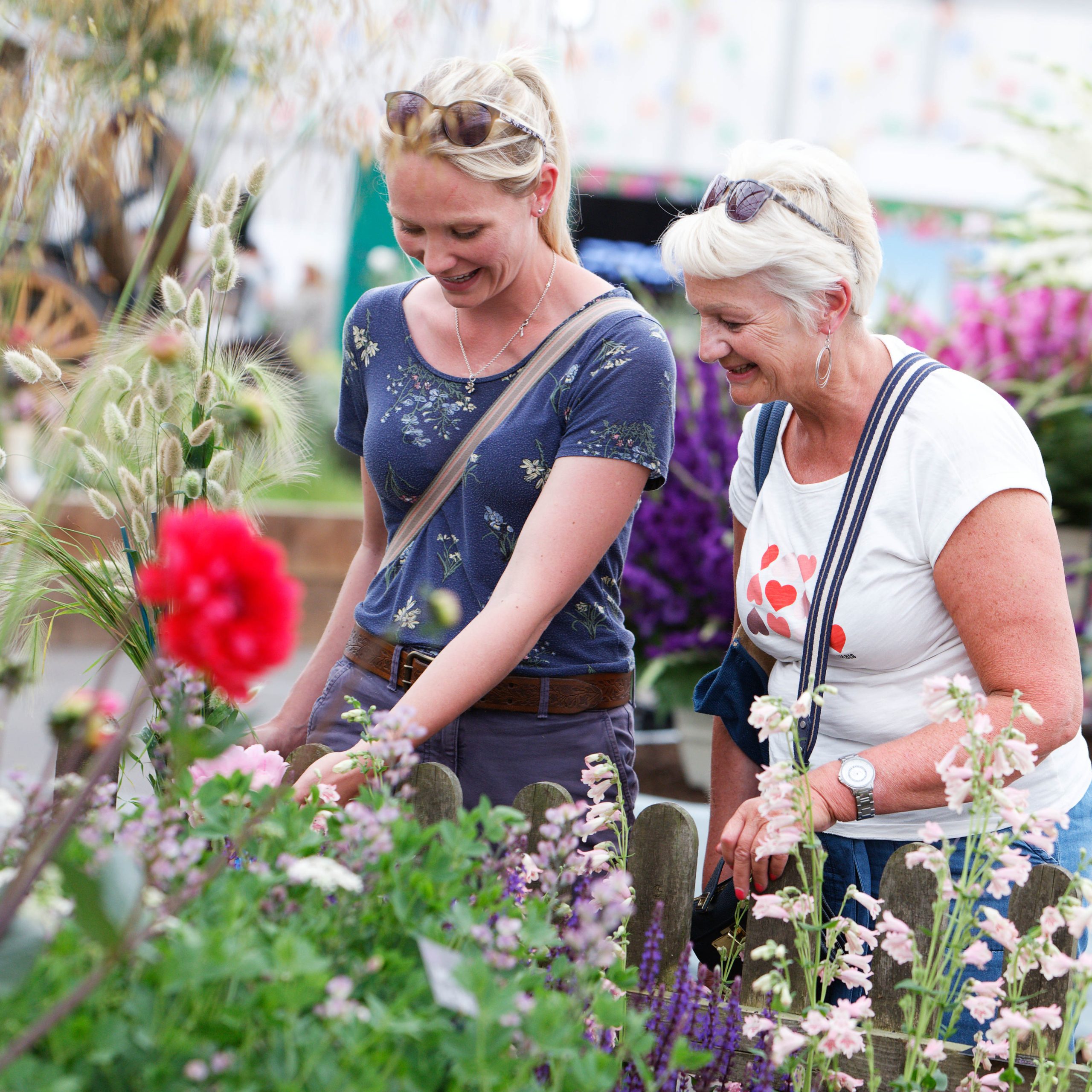 Two ladies admiring flowers at BBC Gardeners' World Live